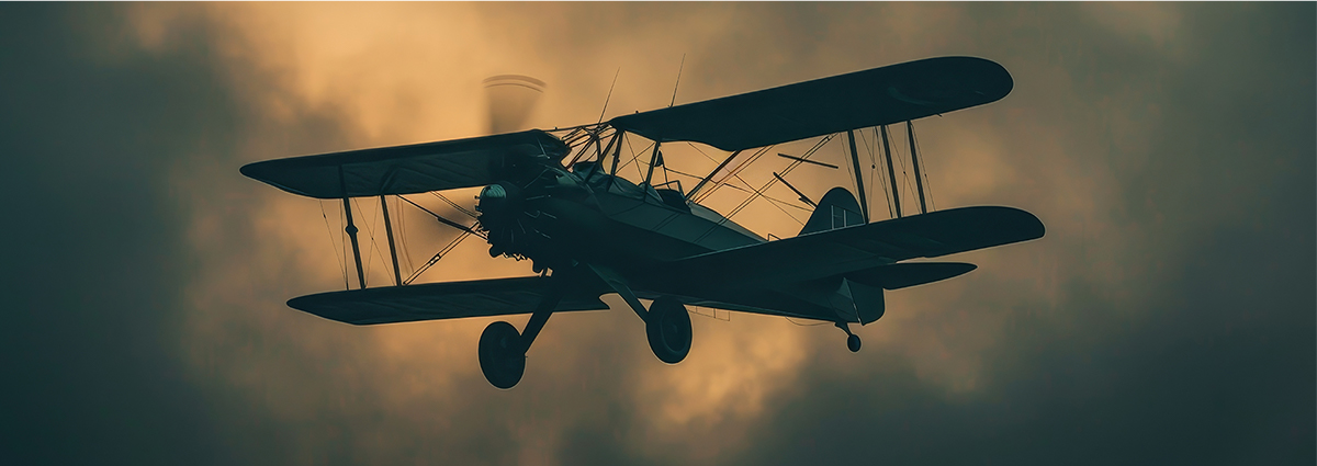 black-white-airplane-flying-through-cloudy-sky-scene-is-mysterious-nostalgic-as-airp